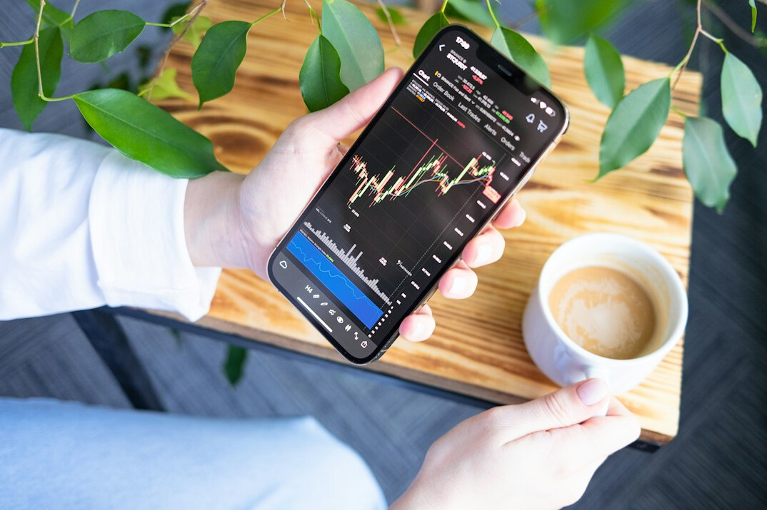 person analyzing stocks